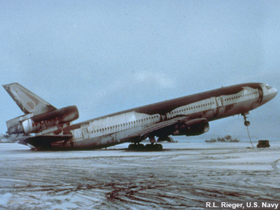 Ashfall on a commercial airplane in the Phillipines after the eruption of Mt. Pinatubo.  So much ash is on the airplane that the tail has tipped to ground.