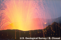 Close view of Stromboli Volcano erupting incandescent molten lava fragments.