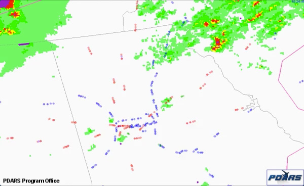 Flight path tracker showing traffic routed around thunderstorms on April 10, 2009