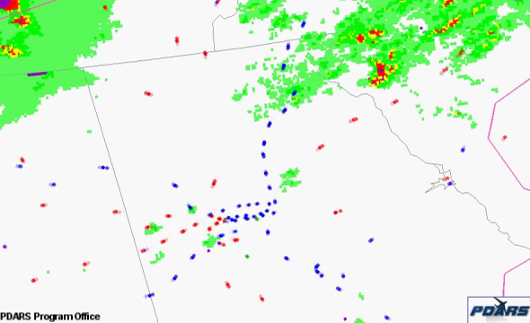 flight path tracker animation showing traffic routed around thunderstorms on April 10, 2009