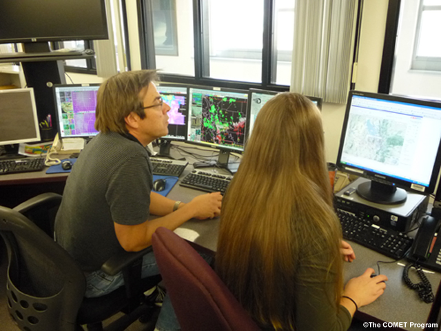 photo of forecasters on shift at National Weather Service Weather Forecast Office