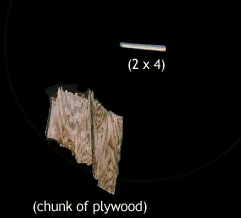 A chunk of plywood and a 2-by-4.