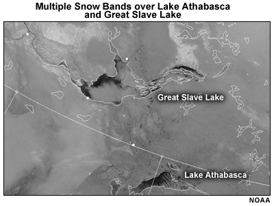 Multiple snow bands over Lake Athabasca and Great Slave lake