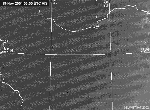 visible loop showing clouds moving over snow in central Iran.