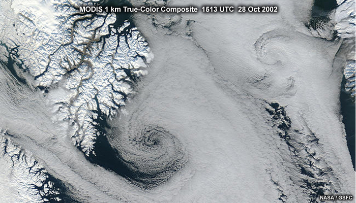 MODIS true-color composite image showing a polar low over the Davis Straight between Nunavut Canada and Greenland, taken at 1513 UTC on October 28, 2002.