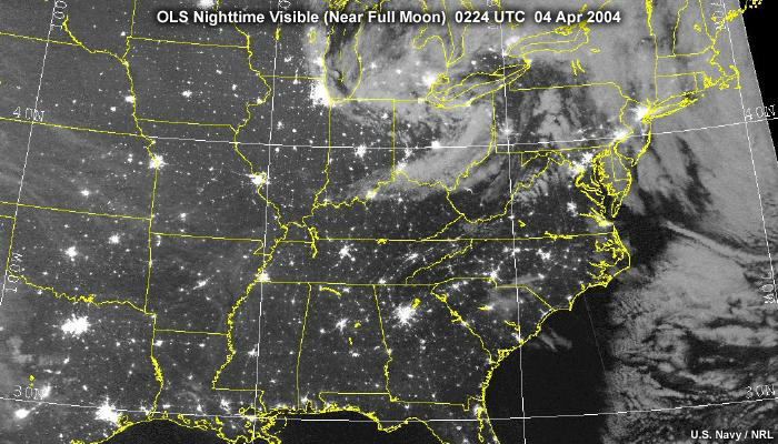 DMSP OLS nighttime visible image over the central and eastern U.S. during full moon conditions showing cloud cover and cities at night; taken at 0224 UTC on April 4, 2004.