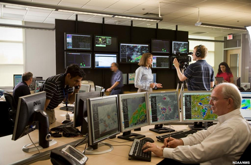 A picture of operations in a weather forecast office.