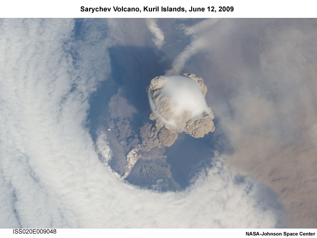 Photo of of Sarychev Volcano, Kuril Islands, Russian Federation, in an early stage of eruption on June 12, 2009