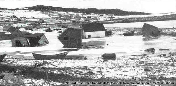 Buildings in Lord's Cove tossed and smashed by the 1929 Grand Banks tsunami in Newfoundland.