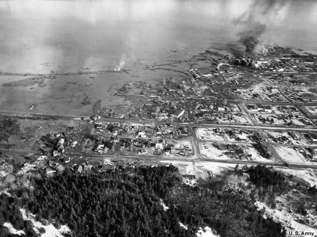 Seward, Alaska flooded, oil tanks burning, following the tsunami of 1964
