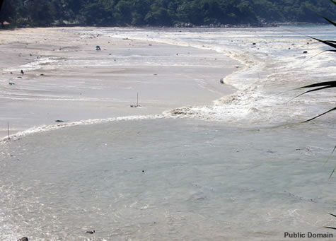 Waves retreat from Kata Noi Beach, Thailand, after the second wave of the 2004 Indian Ocean tsunami.