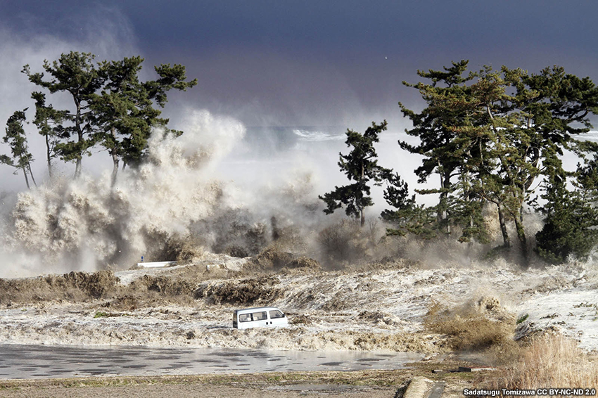 Tsunami waves hitting the coast of Minamisoma in Fukushima prefecture, Japan.