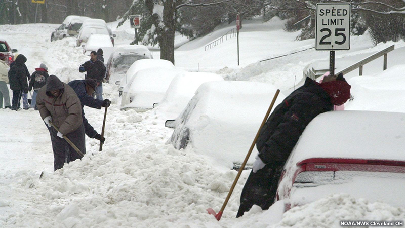 Heavy snowfall in Cleveland, OH due to a winter storm.